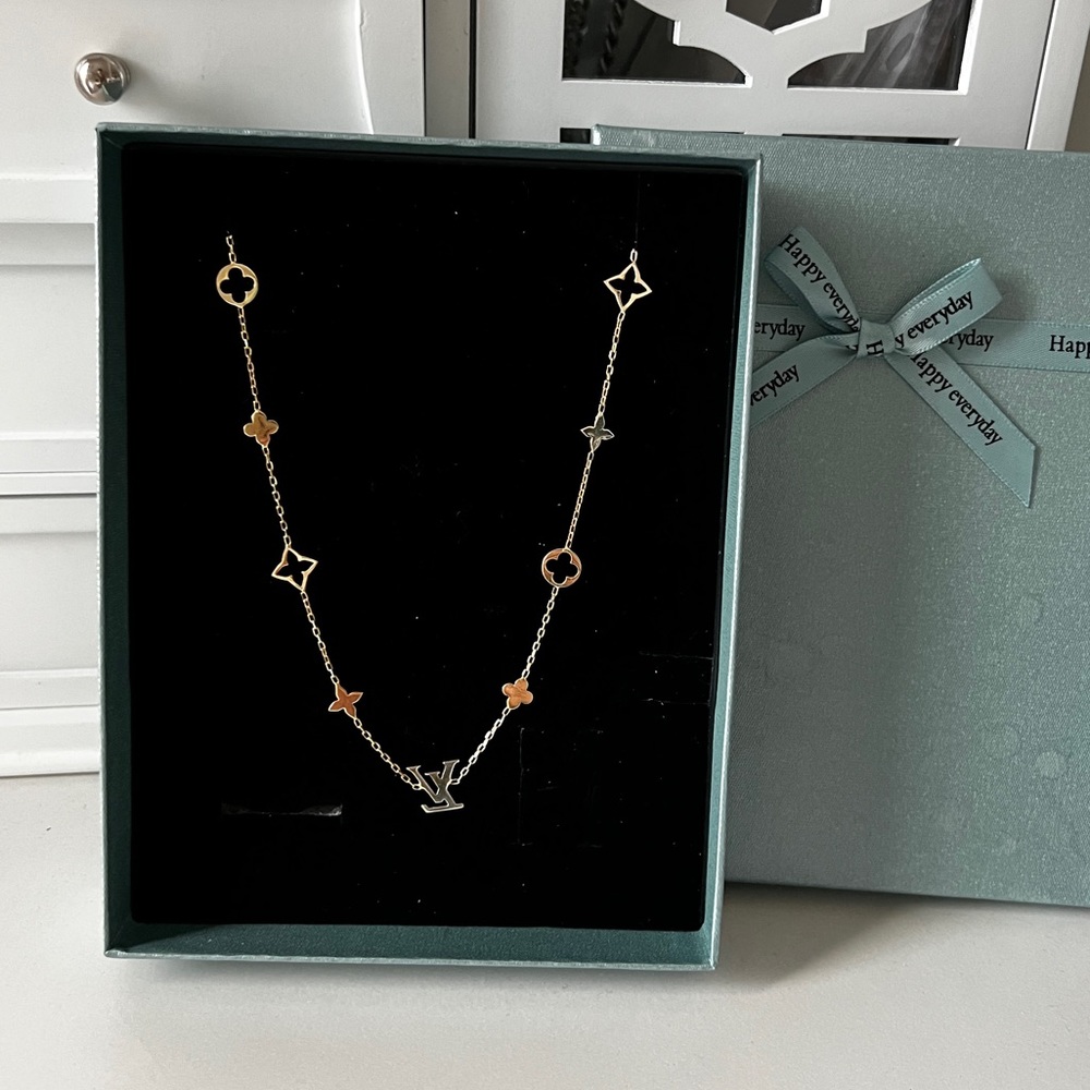 LV 14K gold necklace. Earrings are for sale separately.